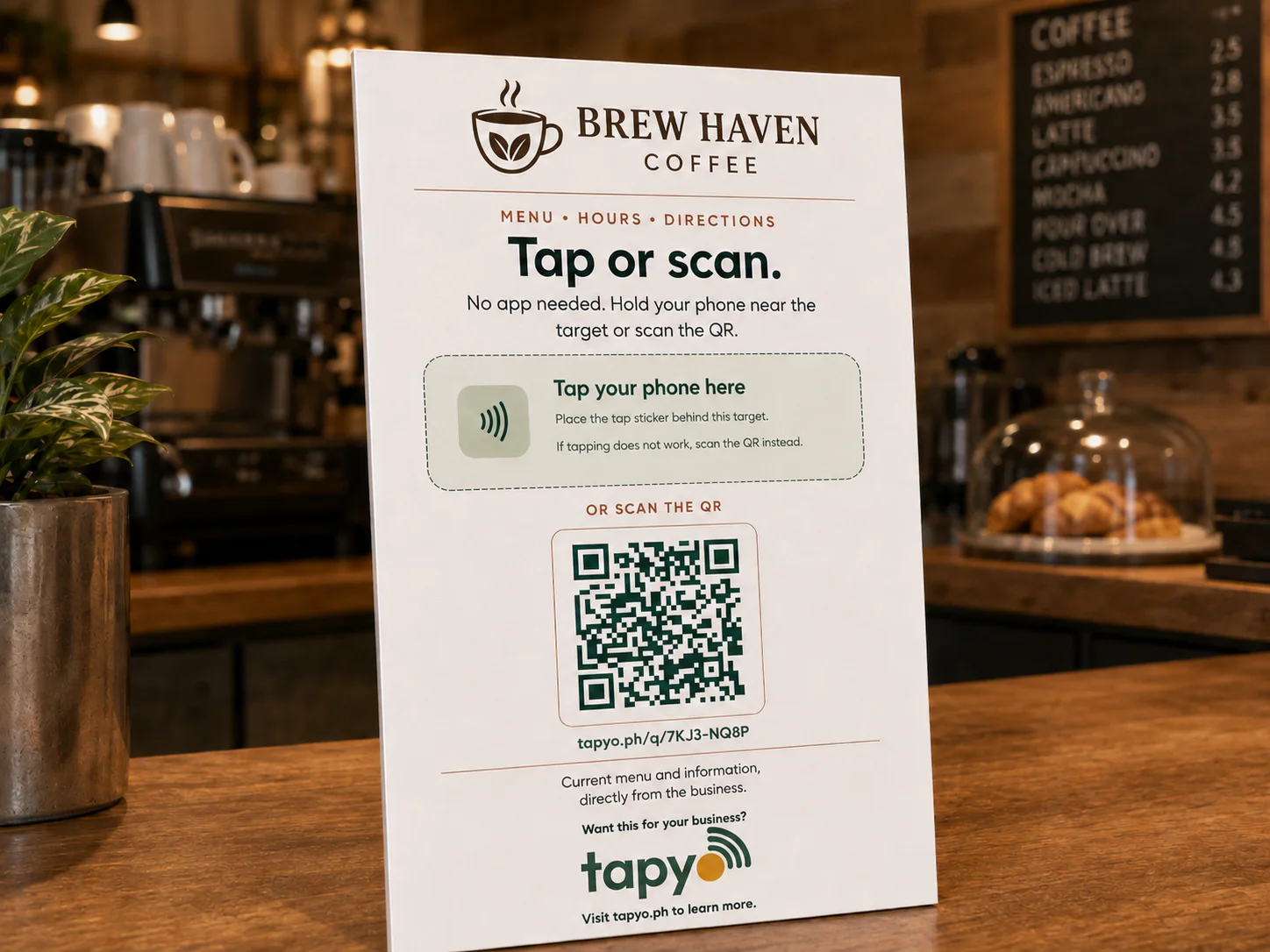 Tapyo tap-and-scan standee on a café counter